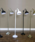 Sweet Matte Black Steel Pharmacy Floor Lamp Featuring Matching Metal Shade And Easy Rotary Switch Ideal For Brightening Up Your Living Room Office Or Cozy Reading Nook With Vintage Meets Modern Vibes amidst other colored lamps.