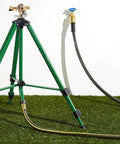 Beefed Up Brass Impact Sprinkler With Adjustable Metal Tripod on grass, hose connected, 1/2 inch head, height adjustable 22-48 inches