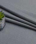 Close-up of fabric texture of Dark Grey Curtains Two Panels 96 Inches Long Light Filtering Faux Linen Textured Window Curtains For Living Room Farmhouse Style Rod Pocket 40 Inch Width Each 2 Pack.