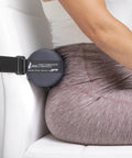 Get The Original McKenzie Early Compliance Lumbar Roll, A Smaller Ergonomic Back Support Pillow with Strap for Proper Spine Alignment, attached to an office chair.