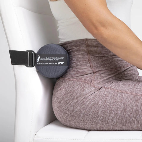 Get The Original McKenzie Early Compliance Lumbar Roll, A Smaller Ergonomic Back Support Pillow with Strap for Proper Spine Alignment, attached to an office chair.