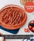 Copper crisper basket and tray set for oven and air fryer with cooked bacon, mesh design for 360 degree airflow, oil-free cooking pan.