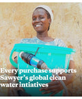 Smiling person holding a blue water bucket with Palm Sized Mini Water Filtration System SP128 Blue attached for clean water access.