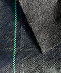 Close-up of Commercial-Grade Weed Control Fabric 4 Ft By 250 Ft, showing woven texture and green stripe design.