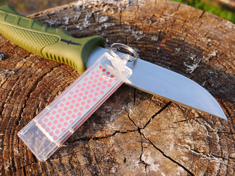 Pocket Diamond Sharpener With Monocrystalline Diamond Surface, Ultra Portable Keychain F70F Fine Grit Sharpener next to knife
