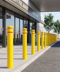 High Density Polyethylene Safety Bollard Covers Refresh Rusty Outposts With Zero Sweat Installation Plus Included Foam Pad For A Snug Setup Blocks Scratches On Pavement While Keeping The Area Looking Clean Without Any Extra Drama Year Round, yellow bollards at a fuel market.