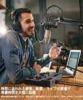 Person using Flow 8 8 Input Digital Mixer With Bluetooth App Control And USB Audio Interface, 60 mm channel faders