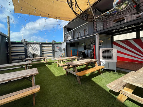 Slash The Sweltering Heat With This Heavy Duty Evaporative Swamp Cooler Featuring A 32 Gallon Tank Variable Speeds And A Massive 4500 Cfm To Keep Your 1200 Square Feet Patio Barn Or Restaurant Cool in a vibrant outdoor setting.