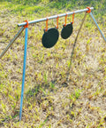 AR500 Steel Target Gong Silhouette For Precision Shooting, Half Inch Thick, Rifle Rated, Laser Cut Accuracy, Ultra Durable Metal Target For Serious Target Practice on stand in field.