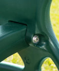 Close-up of Two-Seat Dual Glider Swing With Coated Chains To Prevent Pinching, heavy duty frame detail, backyard use, green color