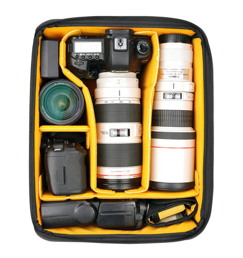 Interior view of camera gear organized in 35L Hiking Camera Backpack With Removable Inner Insert For Pro DSLR With Grip And Five To Six Lenses Up To 300Mm F2.8 Or One Hundred Fifty To Six Hundred Millimeter Carries 15 Inch Laptop And 10 Inch Tablet Dual Tripod Carry Top Daypack Green.