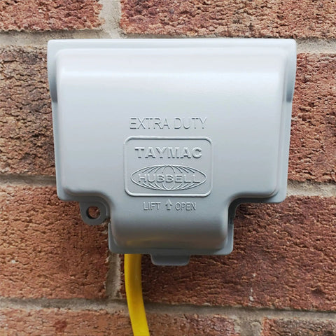 RaynGuard Extra Duty Built Tough Metal Weatherproof In-Use Outlet Cover for Outdoor 1-Gang Gray on brick wall
