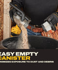 Person emptying canister of Beast 20V Cordless Handheld Vacuum With HEPA Filter LED Light 46 CFM For Dry Debris Car And Workshop Cleanup