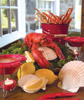 Seafood Shell Cracker And Picks Set, 5 Piece, shown with lobster, shells, lemons, and dipping sauce in a kitchen setting.