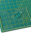 No Sweat 3 Inch Hummingbird Router Inlay Template Cut From Thick Acrylic on cutting mat for woodworking precision.
