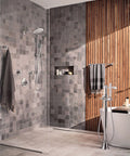 Modern bathroom with Velocity Chrome Two-Function Rain Shower Head With Immersion Technology, 8-Inch Wide Spray, mounted on wall.