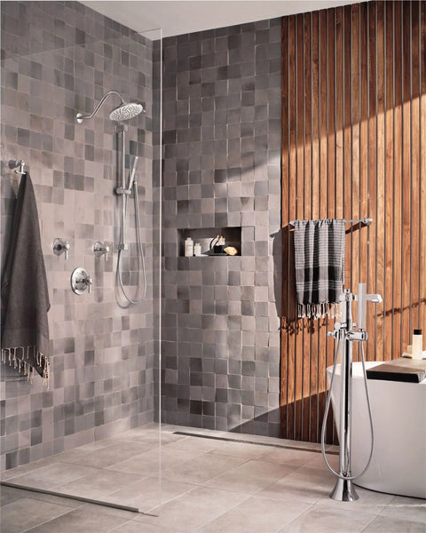 Modern bathroom with Velocity Chrome Two-Function Rain Shower Head With Immersion Technology, 8-Inch Wide Spray, mounted on wall.