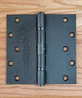Heavy Duty Commercial 6 Inch Square Ball Bearing Door Hinges Oil Rubbed Bronze 2 Pack with smooth pivot design on wood background.