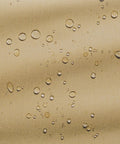 Close-up of durable Rain-Tite fabric with water droplets on Terrazzo Water Resistant 72 Inch Rectangular Oval Patio Table Cover