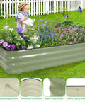 Galvanized Raised Garden Bed Kit 5X3X1 Modular Planter Box For Outdoor Gardening filled with flowers, shown installed on grass with child watering