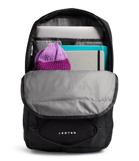 Jester Women Laptop Backpack With Padded Sleeve open showing compartments and contents including a hat and notepads, water-repellent design