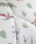 Close-up of Dino Approved Toddler Bed Guard Rail 52 Inch Foam Bed Bumper with Jurassic World dinosaur print design.