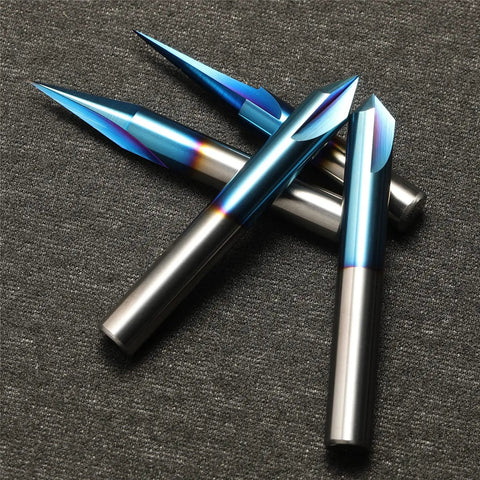 CNC Wood Carving Router Bit Set With 1/4 Inch Shank - 4 Piece, Pro Grade Tungsten Carbide Bits With Nano Blue Coating on gray surface