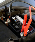 Beefed Up 4 Gauge Jumper Cables for Cars and SUVs, 20 Feet in use on car battery, tangle free and flexible design shown
