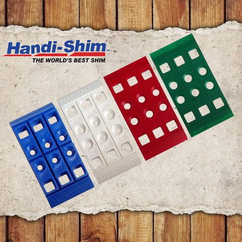 Heavy Duty Reusable Plastic Construction Shims For Spacing And Leveling, 40 Piece Assorted Pack In Four Sizes One Thirty Second Inch One Sixteenth Inch One Eighth Inch One Quarter Inch Ideal For Deep Applications Handi Shim, showing blue, white, red, green sections on textured background.