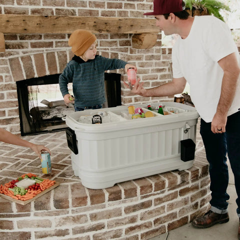 Family using 125 Qt Gray Party Bar Wheeled Cooler With Ultratherm Insulation Removable Lid That Converts To Open Air Beverage Tub