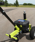 Tow Tuff Electric Trailer Dolly With 3500 Lb Capacity, heavy duty battery powered handcart with wheels on flat surface.