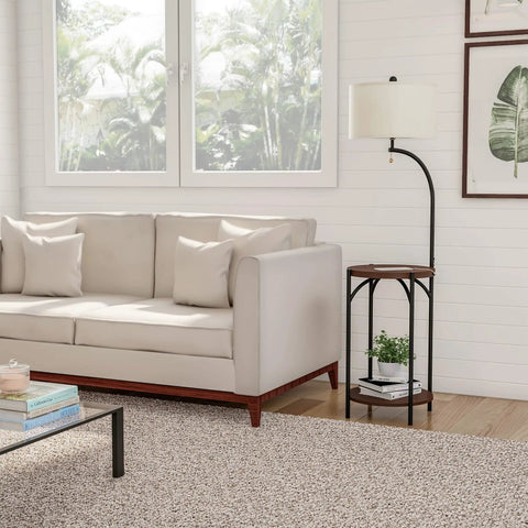 Living room with Go-To Space Saving Floor Lamp With End Table And USB Port beside a beige sofa against a window.