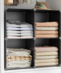 Smooth Setup Stackable Cube Storage Organizer Built For Quick Closet Upgrades And Smart Home Organization Perfect For Shoes Fabric Bins Books And Decor Keeping Your Place Tidy And Totally Fresh with neatly folded blankets and shirts.