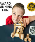 Child playing with Da Vinci Catapult Kit For Kids With Ballista And Bombard, 3D Puzzle Wood Building Toy