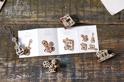 Wooden Fidget Creations Set Four Mini Mechanical Puzzles You Build Without Glue Or Tools, Stress Relief Toys For Adults And Kids, Portable Handcrafted Wood No Glue Needed Great For Focus And Calm, four mini wooden puzzles on wood table