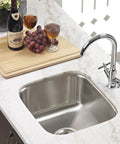 Stainless Steel Kitchen Bar And Prep Sink, 10 Inch Undermount With Strainer, Built To Last, No Fuss Durability For Home Or Apartment Kitchens, Compact Yet Mighty Small Sink For Quick Cleanup installed in a countertop