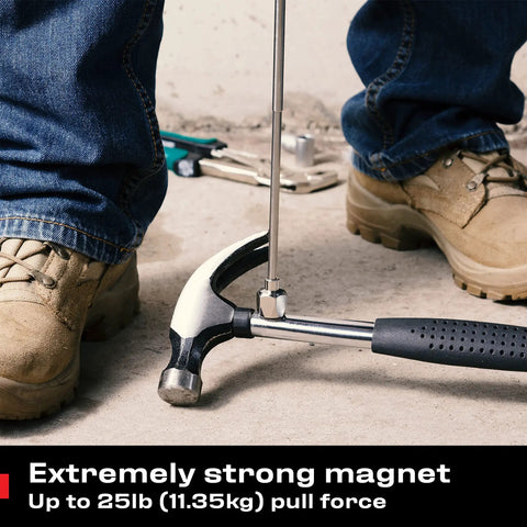 Telescoping Magnetic Pickup Tool With A 25 Pound Pull Stainless Steel Magnet lifting a hammer near feet
