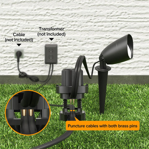 Close-up of 4 Pack 12V Low Voltage Landscape Lighting Kit setup with cable connections and die-cast aluminum spotlight path lights.
