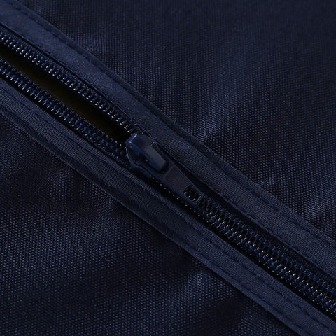Close-up of a zipper on Outdoor Table Cover With Umbrella Hole And Zipper 60x84 Inch Navy Low Maintenance Washable Waterproof Spill Proof Wrinkle Free