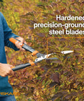 Person using 23 Inch Hedge Shears With PowerGear2 Technology That Multiplies Power For Less Effort on shrub with SoftGrip handles