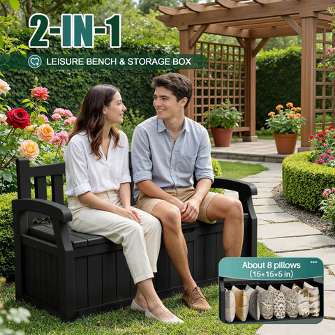 Two people sitting on a black 80 Gallon Lockable Storage Bench Deck Box For Patio Furniture And Outdoor Gear in a garden setting.