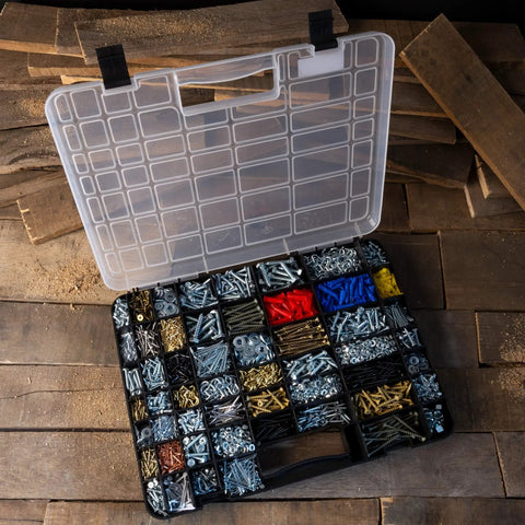 Open portable storage case with secure locks and 55 small bin compartments for hardware, screws, bolts, and more, on wooden surface.