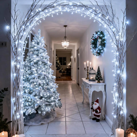 Ultra Long 168Ft 600 LED Cool White String Lights with Remote adorn a holiday archway and tree indoors.