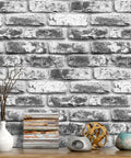 Grey Faux Brick Peel And Stick Wallpaper 17.7 X 393.7 Inches Removable Vinyl Wall Covering For Bathroom Or Living Space Oil And Water Resistant Easy DIY Decor For Quick Install showing textured brick wall surface with vases and decor.