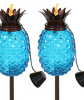 Tropical Pineapple Glass Patio Torch Set Of 2 For Outdoor Lawn Garden Deck And Backyard Lighting 63 Inch Tall Pineapple Vessel Blue