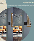 Kalide Dual Load Dimmer Light Switch For LEDs in black finish installed beside a modern living room with pendant lights and sofa.