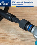 Seven Sixteenths Hex to One Half Inch Square Drive Impact Socket Adapter attached to tool on wood surface