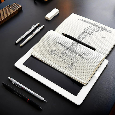Precision 0.5mm Mechanical Pencil With Full Metal Body And Knurled Grip on a desk with drafting tools and sketch pad
