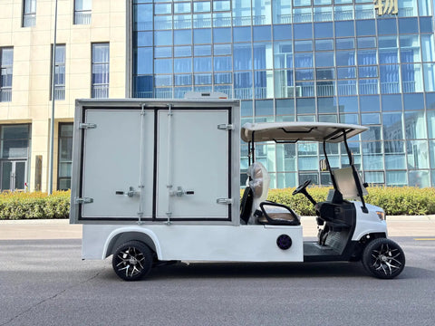 Cruise Around In Style With This Nimble 2 Seater Electric Golf Cart Rolling A Spacious Cargo Bed For Yard Work And Neighborhood Cruises Packed With A Smooth Brushless Motor, side view in a urban setting.