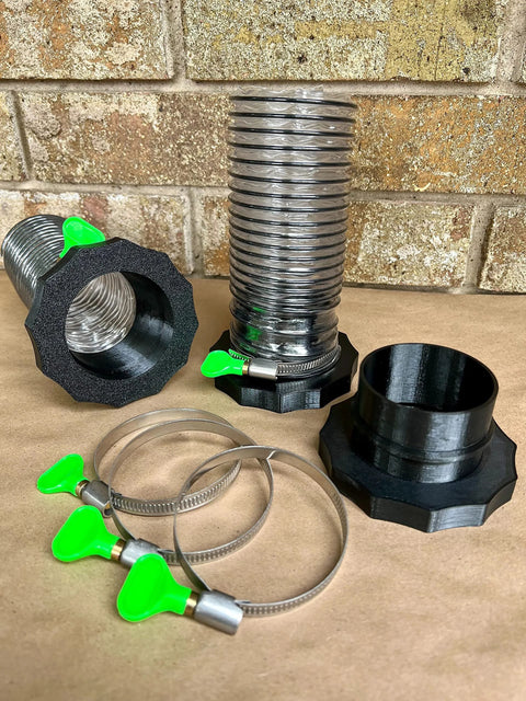 2.5-inch Port MagDuct starter kit: magnetic dust-collector fittings, black plastic adapters, green handles.